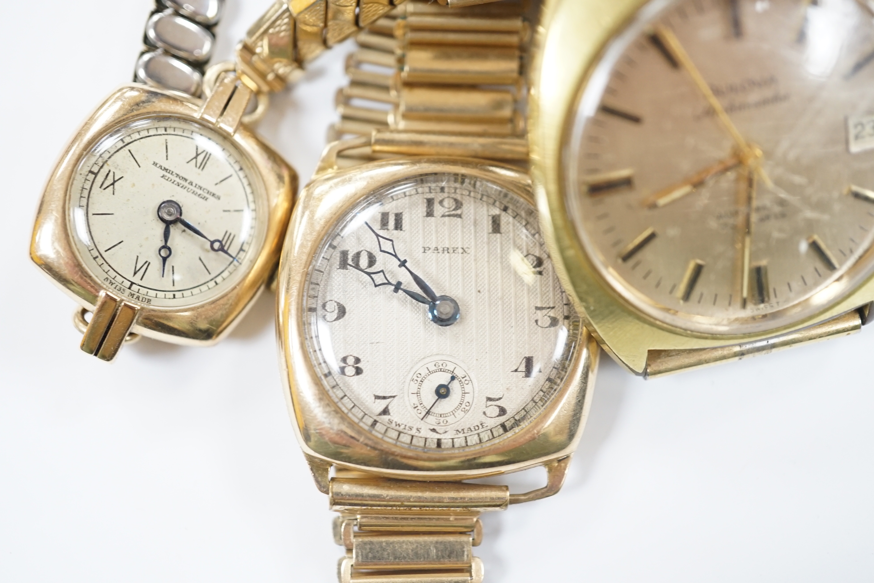 A gentleman's 1930's? yellow metal manual wind Parex wrist watch, on a gold plated bracelet, a lady's 9ct gold manual wind wrist watch, on a steel and gold plated strap and a gentleman's steel and gold plated Bulova Amba